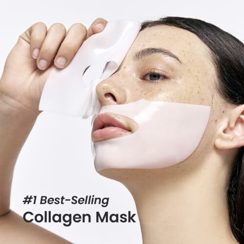 Woman applying collagen mask to her face