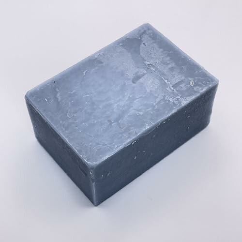 Gray rectangular soap bar on white background